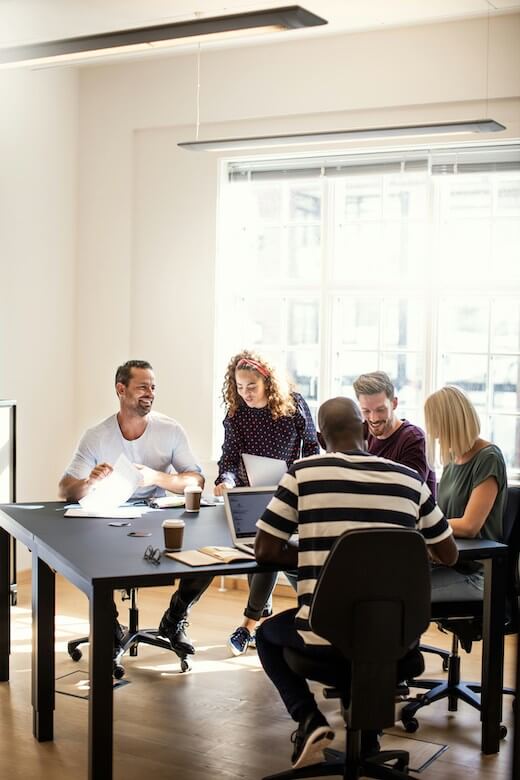 Team discussing ideas in a meeting room